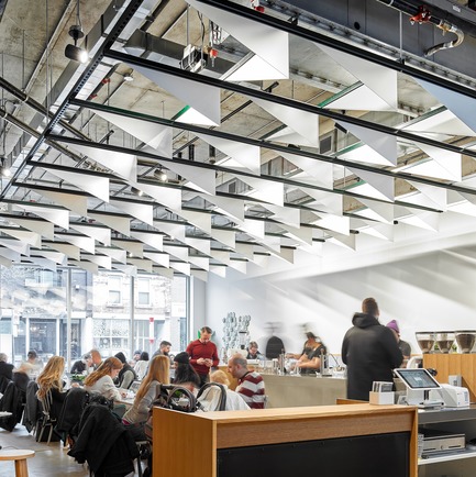 Press kit | 2682-01 - Press release | Innovation Through Design - The Symbiotic Link Between Branding and Architecture - Williamson Williamson Inc. - Commercial Interior Design -     Pilot Ossington Ave. Cafe: A ceiling of custom designed and fabricated fins are shaped to catch and reflect light.<br>[Completion Date: 2019]<br>     - Photo credit:   Scott Norsworthy  