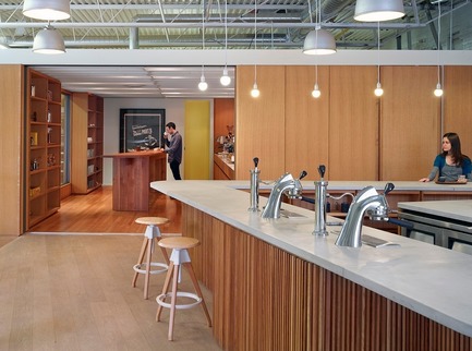 Press kit | 2682-01 - Press release | Innovation Through Design - The Symbiotic Link Between Branding and Architecture - Williamson Williamson Inc. - Commercial Interior Design -    Pilot Wagstaff Roastery: A View of the Cupping Room from the Tasting Bar<br>[Completion Date: 2015]<br>    - Photo credit:   Shai Gil  