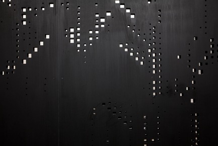 Press kit | 2757-09 - Press release | Montalba Architects Masterfully Conjurs Small Projects with Big Ideas - Montalba Architects - Art -   Utilitarian beauty: The exterior of the 8-meter long trailer features the same custom perforation as found in the interior, a pattern which suggests a dense tree canopy.   - Photo credit:  Mitch Tobias 