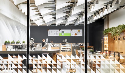 Press kit | 2682-01 - Press release | Innovation Through Design - The Symbiotic Link Between Branding and Architecture - Williamson Williamson Inc. - Commercial Interior Design - Pilot Ossington Ave. Cafe: From the street the ceiling fins act as signage, mimicking Pilot's graphic identity.&nbsp; - Photo credit: Scott Norsworthy