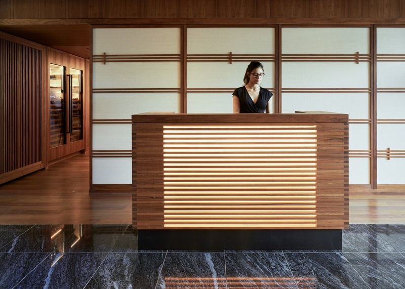 Press kit | 2757-10 - Press release | Montalba Architects Unveils New Hospitality Projects - Montalba Architects - Commercial Architecture - “The entry experience inverts the relationship to light and dark with light marble flooring, bleached white oak paneling and grasscloth wall covering contrasting with rich bronze and teak details,” says architect David Montalba.<span></span> - Photo credit:  Kevin Scott 