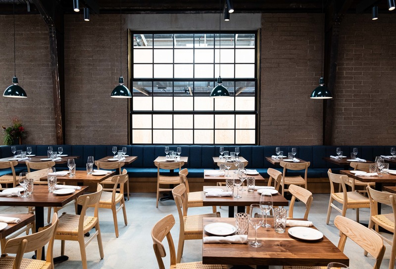 Press kit | 2757-10 - Press release | Montalba Architects Unveils New Hospitality Projects - Montalba Architects - Commercial Architecture - Restored to highlight the industrial elements, the steel beams are visible and highlighted in the dining room.<span></span> - Photo credit: Jim Sullivan