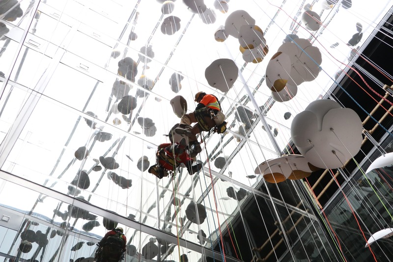 Press kit | 1082-04 - Press release | Pascale Girardin debuts site-specific sculpture for the Four Seasons Hotel Montreal - Pascale Girardin - Art - Rope workers at the upper levels of the hotel.<br style=""> - Photo credit: Stephany Hildebrand
