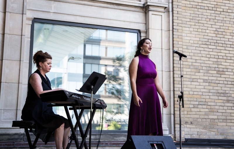Press kit | 907-09 - Press release | ROM Welcome Project - Hariri Pontarini Architects - Institutional Architecture - Jennifer Routhier performs onstage at the Helga and Mike Schmidt Performance Terrace. - Photo credit:  Hariri Pontarini Architects 
