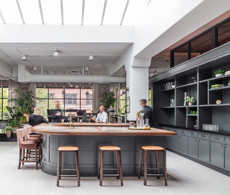 Press kit | 2886-03 - Press release | objekts - SkB Architects - Commercial Interior Design - The hospitality bar is both meeting and social hub, complete with turntable and beverage service.   - Photo credit: Nicholas Worley