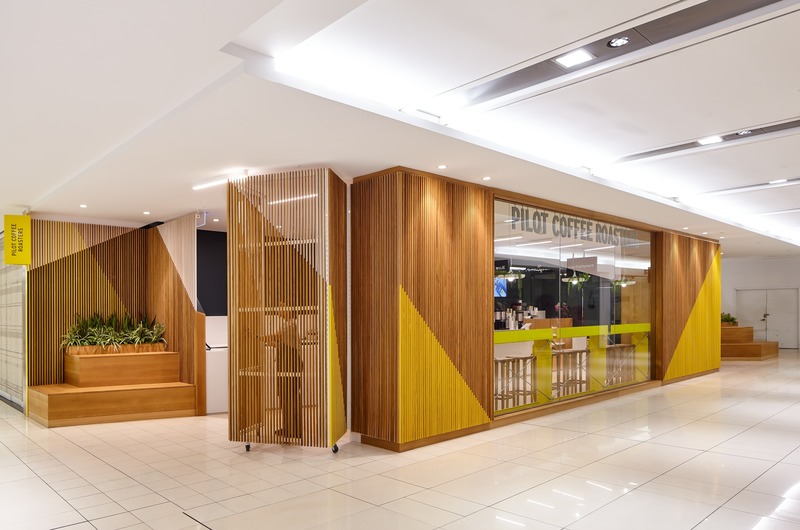 Press kit | 2682-01 - Press release | Innovation Through Design - The Symbiotic Link Between Branding and Architecture - Williamson Williamson Inc. - Commercial Interior Design - Pilot Manulife: The front gate being opened and folded back.  - Photo credit: Scott Norsworthy