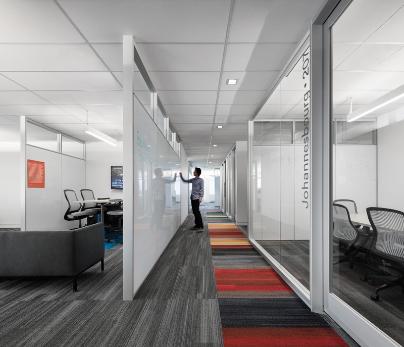 Press kit | 3143-02 - Press release | Genetec Spaces in Montreal: When Design Impacts Processes and Productivity - FOR. design planning - Commercial Interior Design - Each Innovation Circle includes a Microsoft Surface Hub. Employees are able to write on 100% of the walls, made of whiteboards and glass - Photo credit: Stéphane Brugger