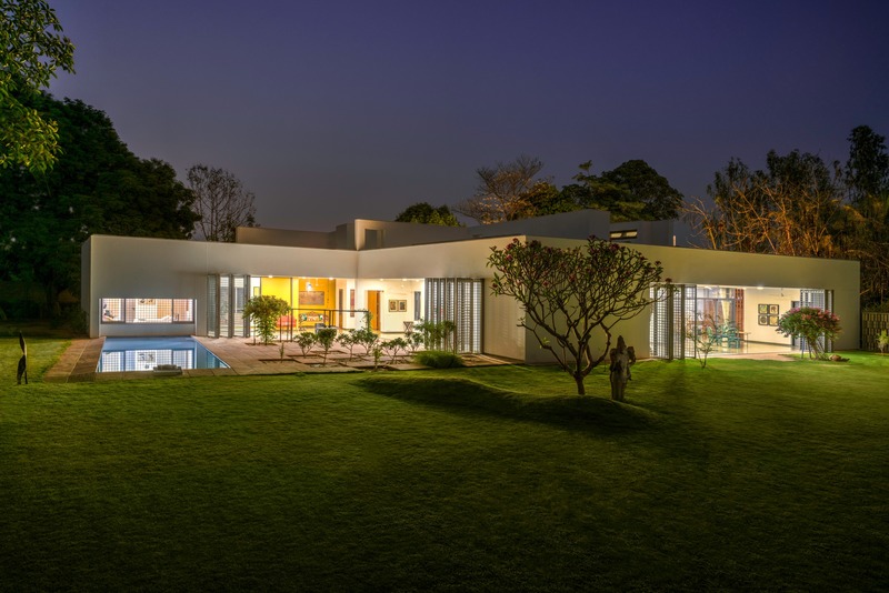 Press kit | 4016-02 - Press release | An Atypical Single User Villa - SquareWorks - Residential Architecture - Night view demonstrating the flexibility of sliding-folding safety grill - Photo credit: Fabien Charuau