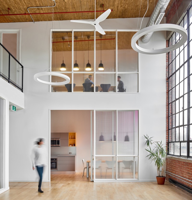Press kit | 1513-05 - Press release | Azure Publishing Office - Dubbeldam Architecture + Design - Commercial Interior Design -  <p class="">A double-height space captivates with its volumetric expansion, with 16-foot-tall original factory windows framed in black metal providing even north light.<br></p>  - Photo credit: Scott Norsworthy