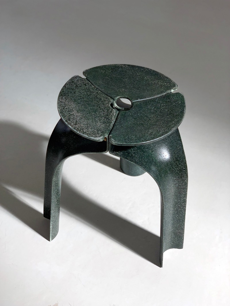 Dossier de presse | 2704-10 - Communiqué de presse | Pure Talents Contest 2020: 20 ideas for the lifestyles of tomorrow - imm cologne 2020, Koelnmesse GmbH - Évènement + Exposition - <p>Triplex Stool by Whitnie Yvette Lau and Dennis Cheung</p><p><br></p><p>Triplex is an experimental item of furniture that pushes the physical limits of a stool, from structure, weight and dimensions to assembly, delivery and after-life. It is unprecedented in the industry. The module is made of flax fibre, one of the strongest natural cellulose materials. Designed with a strategically curved geometry, the less than 3mm thick stool stands elegantly on its arches and embraces the weight it carries.</p> - Crédit photo : Whitnie Yvette Lau, Dennis Cheung; Koelnmesse