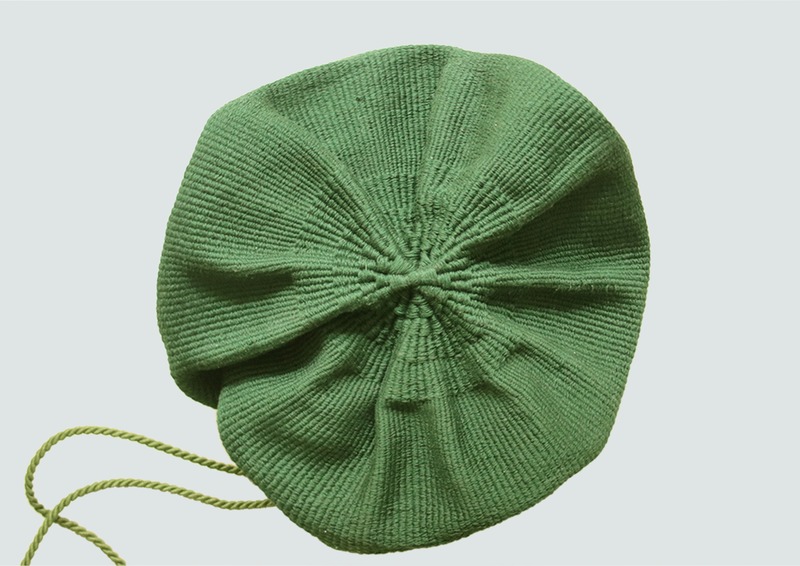 Dossier de presse | 2704-10 - Communiqué de presse | Pure Talents Contest 2020: 20 ideas for the lifestyles of tomorrow - imm cologne 2020, Koelnmesse GmbH - Évènement + Exposition - <p>braided weave by Sofie Leenen</p><p><br></p><p>Handmade, braided, woven carpet that can transform into a basket: This project started as an investigation of the similarities between textile weaving and basket braiding. The constructions of the techniques differ greatly, and each technique has its own characteristics of complexity and identity. The carpet has a flat surface with a circular contour. A rope is pulled through the loops at the ends. When the rope is pulled, the contour of the circle comes together as a 3-dimensional shape.</p> - Crédit photo : Photo: Sofie Leenen; Koelnmesse