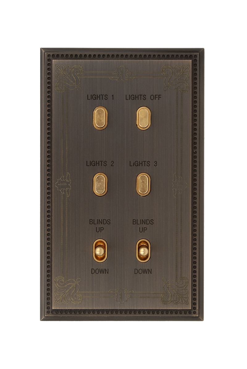 Press kit | 2630-05 - Press release | MELJAC enhances the edges of its lighting controls plates - MELJAC - Product - <p class="">Solid brass, Bronze Médaille Foncé finish</p><p class="">Machined and engraved edges</p><p class="">80x142x4 mm</p><p class="">4 Ellipse push buttons and 2 Seattle levers</p> - Photo credit: Meljac