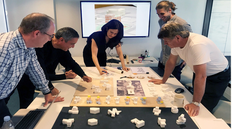 Press kit | 1456-11 - Press release | The Yazdani Studio of CannonDesign Celebrates 20th Anniversary - CannonDesign - Commercial Architecture - Yazdani Studio team collaborating - Photo credit: Yazdani Studio of CannonDesign