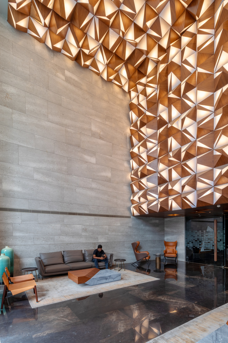 Dossier de presse | 1432-09 - Communiqué de presse | EXCELLENSEAA 126 by Happy Homes - Sanjay Puri Architects - Architecture résidentielle -  <p>Each building is entered through a sculptural lobby</p>  - Crédit photo : Mr.Abhishek Shah