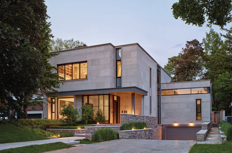 Press kit | 2941-01 - Press release | Russell Hill Road Residence - Taylor Smyth Architects - Residential Architecture - Exterior clad in large slabs of Indiana Limestone with a base of split faced Ontario Algonquin stone. - Photo credit: Studio Shai Gil