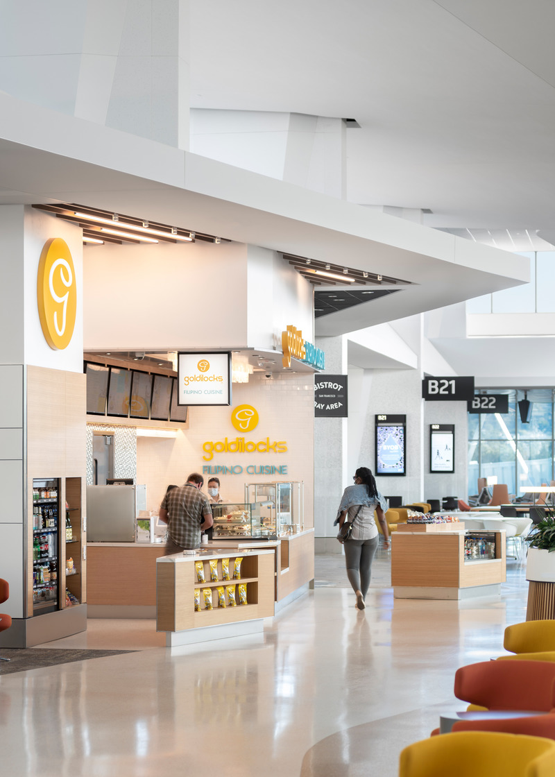 Dossier de presse | 2757-20 - Communiqué de presse | William Duff Architects' Latest Projects at SFO Showcase Trends in Airport Dining Amenities - William Duff Architects (WDA) - Architecture commerciale - <p class="">Goldilocks: Iva Chen, director of business development and marketing for Lady Luck Gourmet, Goldilocks' operating company, worked with WDA and a project team that included: Terra Nova Industries (general contractor), KPFF Consulting Engineers (structural), ACIES Engineering (MEP); Architectural Woodwork of Montana (millwork); and Sara Ali (designer).</p> - Crédit photo : <p class="">Patrik Argast</p>