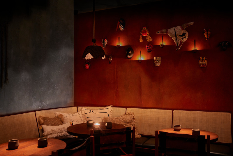 Press kit | 5594-01 - Press release | KOL by A-nrd studio - A-nrd studio - Commercial Interior Design - Kol Mezcaleria - corner detail with vintage wall candles holders and Mexican folk art - Photo credit: Charlie Mckay 