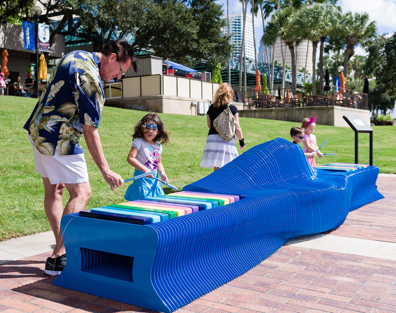 Dossier de presse | 5595-01 - Communiqué de presse | A Design Studio Showcasing the Value of Play - The Urban Conga - Art -   Project 5: Why sit when you can play is a musical bench system designed to bring the everyday park bench back to life.   - Crédit photo : The Urban Conga