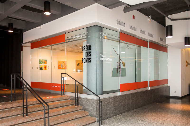 Press kit | 870-11 - Press release | How to reduce vacant retail spaces in Downtown areas: A historic collaboration between commercial real estate and the visual arts community in Canada - Art Souterrain - Art -   Brett Barmby et Andrew Oliver at Place des Arts in Montreal.   - Photo credit:  Thierry du Bois 