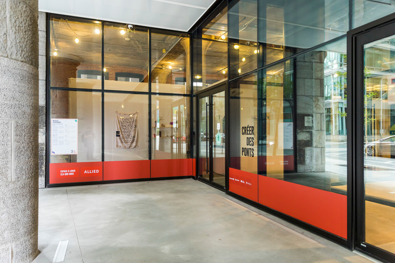 Press kit | 870-11 - Press release | How to reduce vacant retail spaces in Downtown areas: A historic collaboration between commercial real estate and the visual arts community in Canada - Art Souterrain - Art - Viger building window in Montreal.  - Photo credit: Thierry du Bois