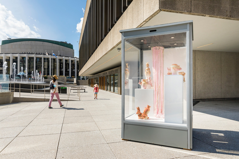 Press kit | 870-11 - Press release | How to reduce vacant retail spaces in Downtown areas: A historic collaboration between commercial real estate and the visual arts community in Canada - Art Souterrain - Art - Exhibition glass cube with Hearyung Kim works at the Esplanade of Place des Arts in Montreal. - Photo credit: Thierry du Bois