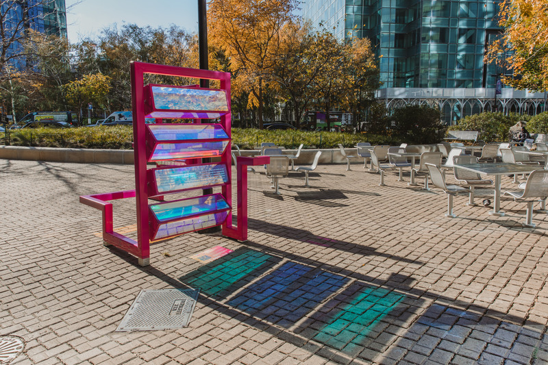Press kit | 5595-03 - Press release | A Playful Gesture Designed to Evoke Communal Connection in Long Island City, NY - The Urban Conga & Hive Public Space - Art - The sun cast changing colors of light onto the surrounding built environment.  - Photo credit: Savannah Lauren
