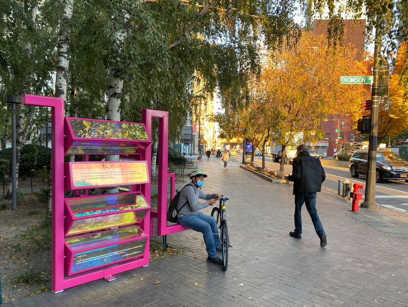 Press kit | 5595-03 - Press release | A Playful Gesture Designed to Evoke Communal Connection in Long Island City, NY - The Urban Conga & Hive Public Space - Art - Ribbon is set up along several different public transit hubs such as a bus stop, subway stop, and Citi bike rental.  - Photo credit: Savannah Lauren