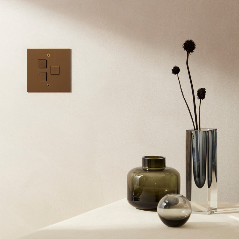 Press kit | 2651-03 - Press release | Control Switches by Focus SB: Smart Home Collection is Unveiled - Focus SB Ltd - Product -  3 gang button with LED bronze antique control switches by Focus SB<br>  - Photo credit: <p>Focus SB Ltd / Sally Williams Photography</p>