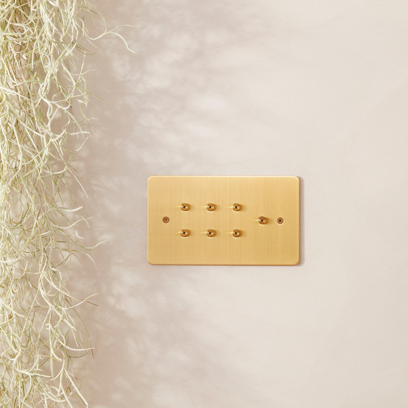Press kit | 2651-03 - Press release | Control Switches by Focus SB: Smart Home Collection is Unveiled - Focus SB Ltd - Product -  7 gang horizontal round button with LED satin brass control switches by Focus SB  - Photo credit: <p>Focus SB Ltd / Sally Williams Photography</p>