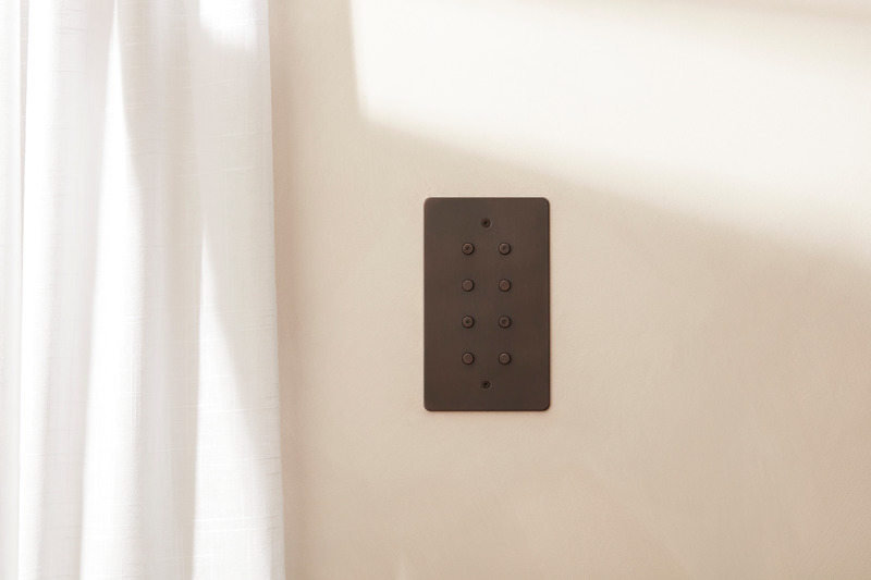 Press kit | 2651-03 - Press release | Control Switches by Focus SB: Smart Home Collection is Unveiled - Focus SB Ltd - Product -  8 gang vertical 4 buttons with LED chocolate bronze control switches by Focus SB  - Photo credit: <p>Focus SB Ltd / Sally Williams Photography</p>