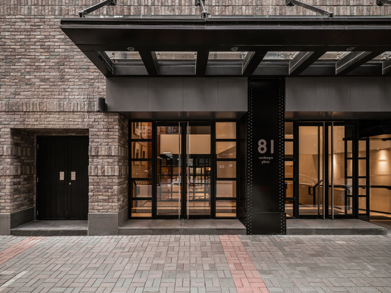 Dossier de presse | 4908-01 - Communiqué de presse | Hong Kong Studio via. Unveils Hybrid Office Centered on Creativity and Wellbeing - via. - Design d’intérieur commercial -  <p class="">Contempo is located within a renovated industrial building with a brick facade.</p>  - Crédit photo : Kenneth Chao