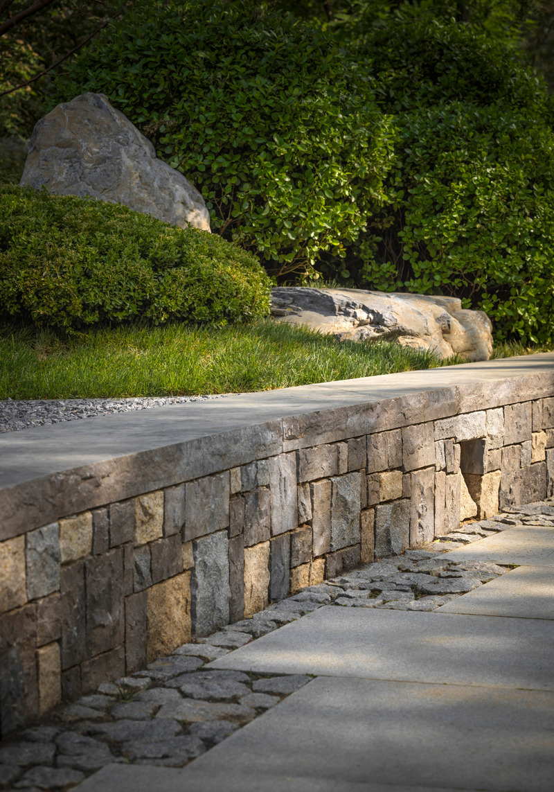 Dossier de presse | 5086-01 - Communiqué de presse | MAHA Residential Gardens Popular Choice Winner at the 2022 Architizer A+ Awards - Ballistic Architecture Machine (BAM) - Architecture de paysage - In regions where paths must be wide enough to allow for buggies to pass, this method of breaking down the paving allows for the path to be visually<br style="">much smaller than its functional requirement mandates.<br style=""> - Crédit photo : Jonathan Leijonhufvud