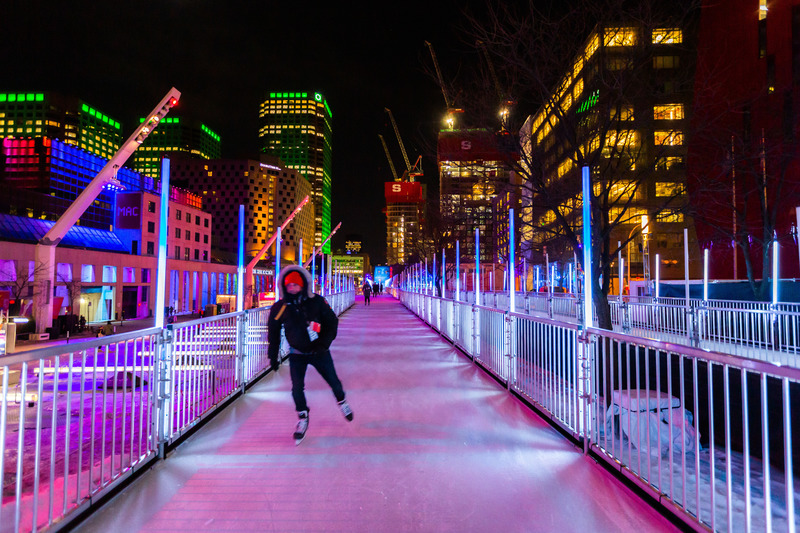 Press kit | 6776-01 - Press release | A Winter Experience Like no Other in the World. The Montréal en Lumière Festival Opens a 1000-Foot-Long Aerial Skating Trail with an Ambience of Immersive Sound and Light - Montréal en Lumière - Urban Design -  A path illuminated by 265 LED tube lights  - Photo credit:  Frédérique Ménard-Aubin for MONTRÉAL EN LUMIÈRE 