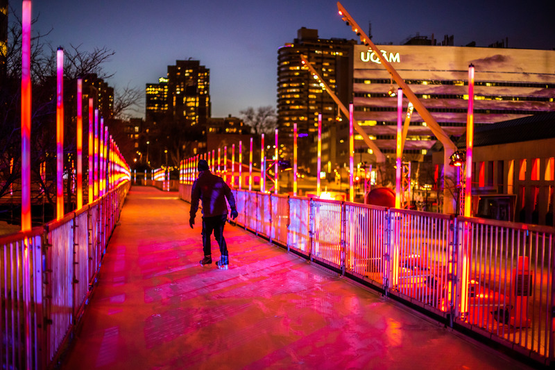 Press kit | 6776-01 - Press release | A Winter Experience Like no Other in the World. The Montréal en Lumière Festival Opens a 1000-Foot-Long Aerial Skating Trail with an Ambience of Immersive Sound and Light - Montréal en Lumière - Urban Design -   A rink made of 300 meters (1,000 feet) of artificial ice   - Photo credit:  Frédérique Ménard-Aubin for MONTRÉAL EN LUMIÈRE 