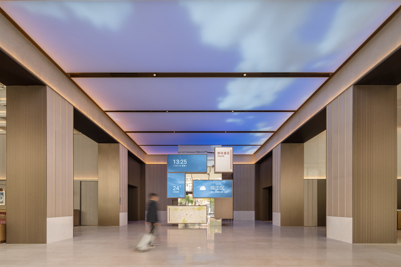 Press kit | 3531-08 - Press release | Intercity Hotel - Vermilion Zhou Design Group - Commercial Interior Design -  Hotel Lobby: The combined screen clearly shows the times and local information  - Photo credit: Wu Jian Quan