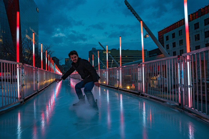 Press kit | 6776-01 - Press release | A Winter Experience Like no Other in the World. The Montréal en Lumière Festival Opens a 1000-Foot-Long Aerial Skating Trail with an Ambience of Immersive Sound and Light - Montréal en Lumière - Urban Design - 85m3 of ice on a cooling mat - Photo credit:  Victor Diaz Lamich for MONTRÉAL EN LUMIÈRE 