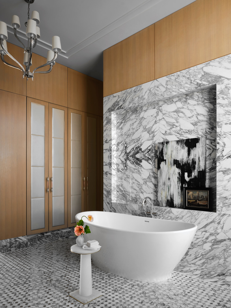 Press kit | 6087-03 - Press release | Family Connections: a Five-Star Retreat in the Desert Southwest - Daniel Joseph Chenin, Ltd. - Residential Interior Design - <p>The feminine bathroom design, characterized by lighter stone patterns and a stand-alone soaking tub.</p> - Photo credit: Douglas Friedman