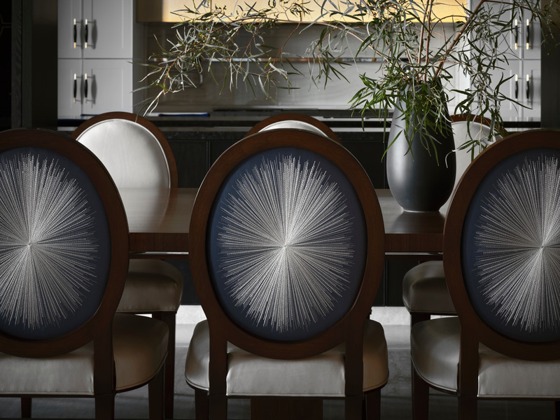Press kit | 6087-03 - Press release | Family Connections: a Five-Star Retreat in the Desert Southwest - Daniel Joseph Chenin, Ltd. - Residential Interior Design -  The main dining room chairs feature a hand-embroidered fabric with radial patterns custom designed by Daniel Joseph Chenin.  - Photo credit:  Douglas Friedman 
