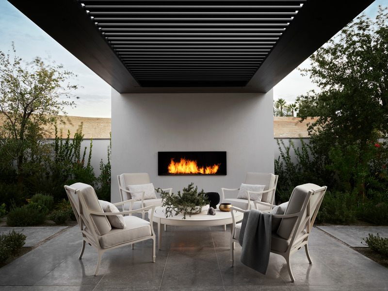 Press kit | 6087-03 - Press release | Family Connections: a Five-Star Retreat in the Desert Southwest - Daniel Joseph Chenin, Ltd. - Residential Interior Design - A private, outdoor sitting courtyard, with built in fire feature that is accessible through steel and glass doors from the study. - Photo credit: Douglas Friedman