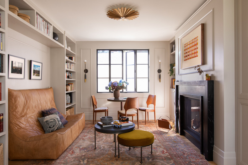 Press kit | 2757-35 - Press release | Medium Plenty Gives a Sprawling Update to a Once Modest 1920s Spanish Revival Home - Medium Plenty - Residential Interior Design -  In this cozy family room, the team introduced a new chimney and fireplace, as well as a variety of seating options, for reading and working.  - Photo credit:  Laure Joliet Photography 
