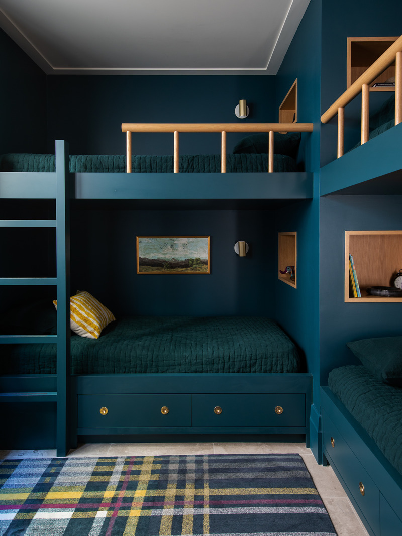 Press kit | 2757-35 - Press release | Medium Plenty Gives a Sprawling Update to a Once Modest 1920s Spanish Revival Home - Medium Plenty - Residential Interior Design -  This cozy bedroom becomes overflow space for visiting family. The beds were built with vertical space to allow for fun activities like playing board games.  - Photo credit:  Laure Joliet Photography 