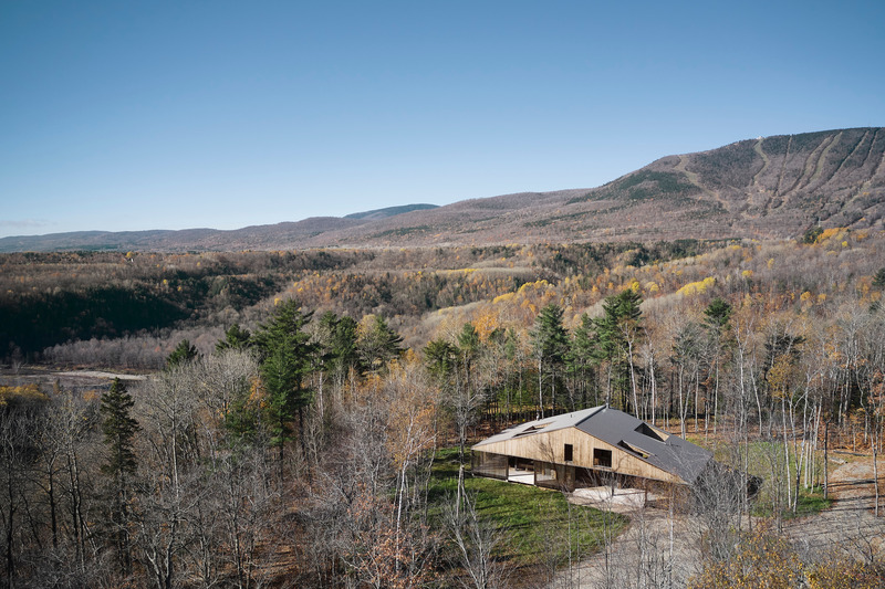 Press kit | 1640-01 - Press release | Territories and Landscapes Exhibition in Paris by Atelier Pierre Thibault - Atelier Pierre Thibault - Event + Exhibition - Résidence Maison du Cap (2021), Beaupré, Charlevoix<br><p>Perched on a headland in the middle of the Quebec forest, La maison du Cap hovers over ferns, rocks and moss. Designed as an island within an island, the project is organized in a manner where all the living spaces are surrounded by a large wooden terrace hanging over the luxurious vegetation cover. With a rectangular plan shape, the house offers unusual proportions nicely contrasting with the slender verticality of the trees. The traditional dual-pitch roof is revisited to inverse its proportions; the ridge is positioned on the short side. The clients like saying that the surprising shape of the house reminds them the close-by mountain for which they fell in love when acquiring</p><p>the lot. Highly interesting contrasts can be observed on site.</p> - Photo credit: Maxime Brouillet