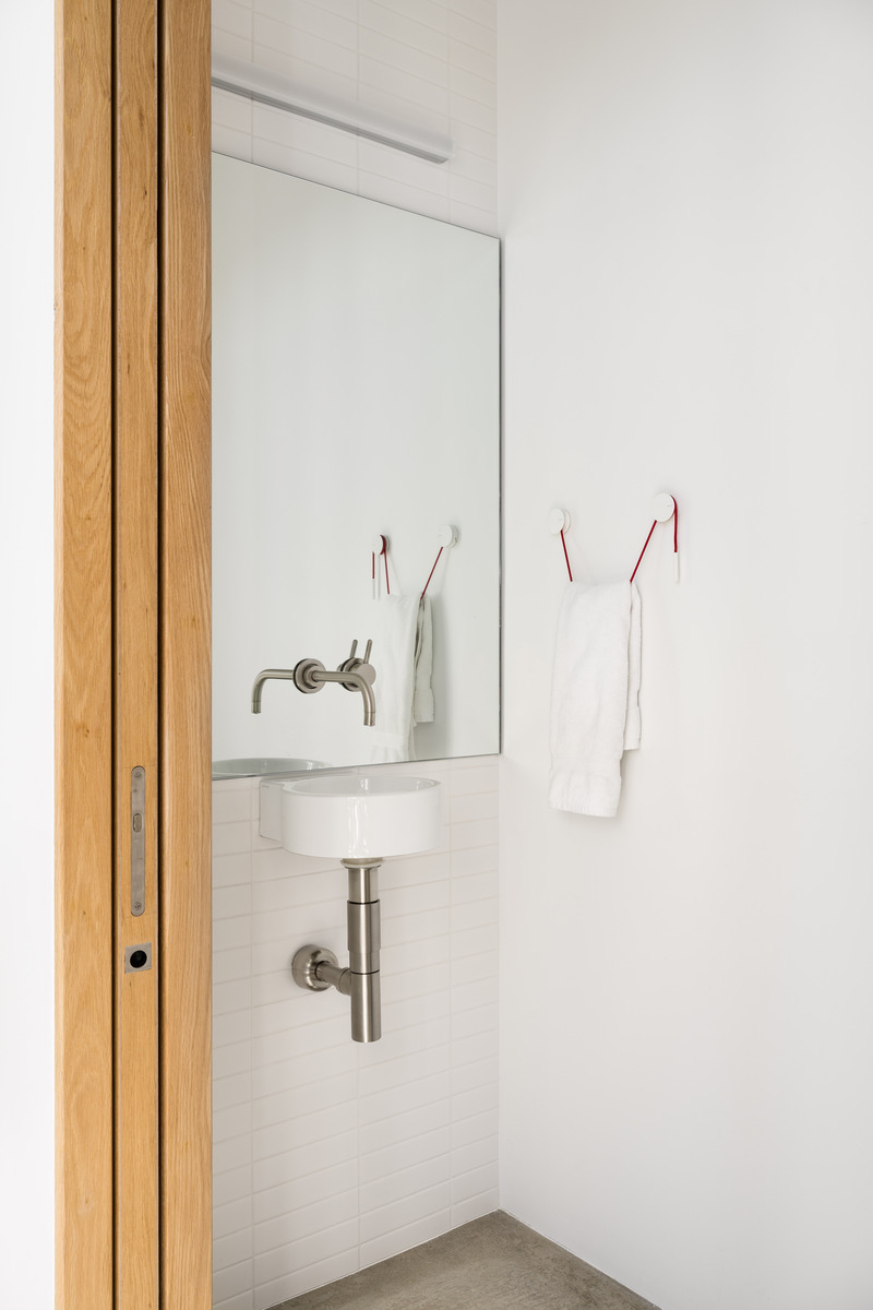Press kit | 2757-36 - Press release | Sparano + Mooney Architecture's Wabi-Sabi Residence Draws Upon Japanese Aesthetic Culture - Sparano + Mooney Architecture - Residential Architecture -  <p class="">This wall-mounted sink in the hall bathroom highlights how a thoughtful design approach can maximize functionality in a small space.</p>  - Photo credit: Lucy Call