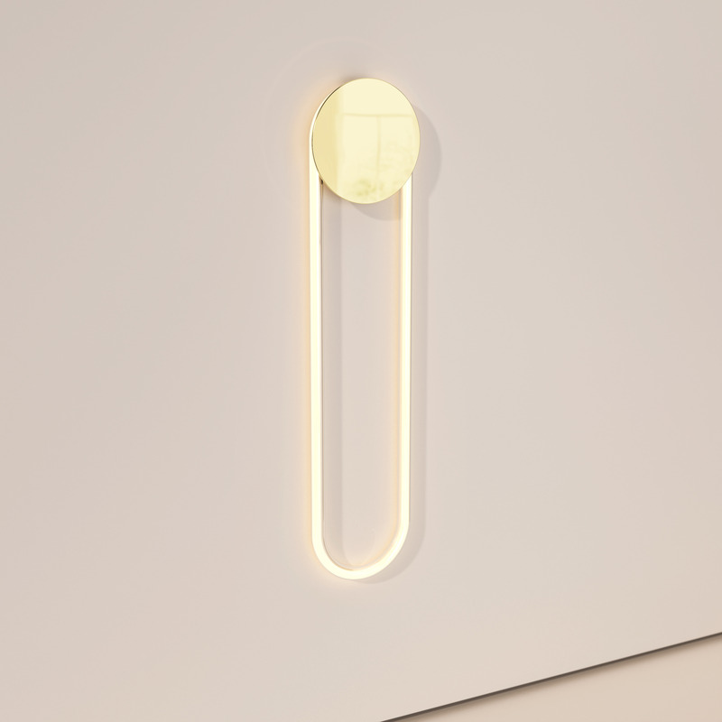Press kit | 2375-08 - Press release | Back at the ICFF/Wanted Design to Introduce the Hyphen Wall and Upgrades on the Iconic RA Collection - d'Armes - Lighting Design - RA Wall Long in 12k gold - Photo credit:  d'Armes 