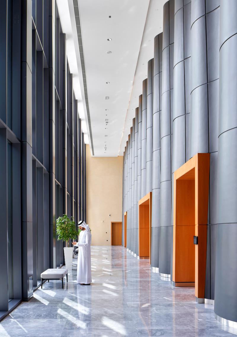 Dossier de presse | 7004-01 - Communiqué de presse | Shape’s Diplomatic Academy Adds Architizer A+ Award to Portfolio of Accolades - Shape Architecture Practice + Research - Architecture institutionnelle - Auditorium Walkway - Crédit photo : Phil Handforth