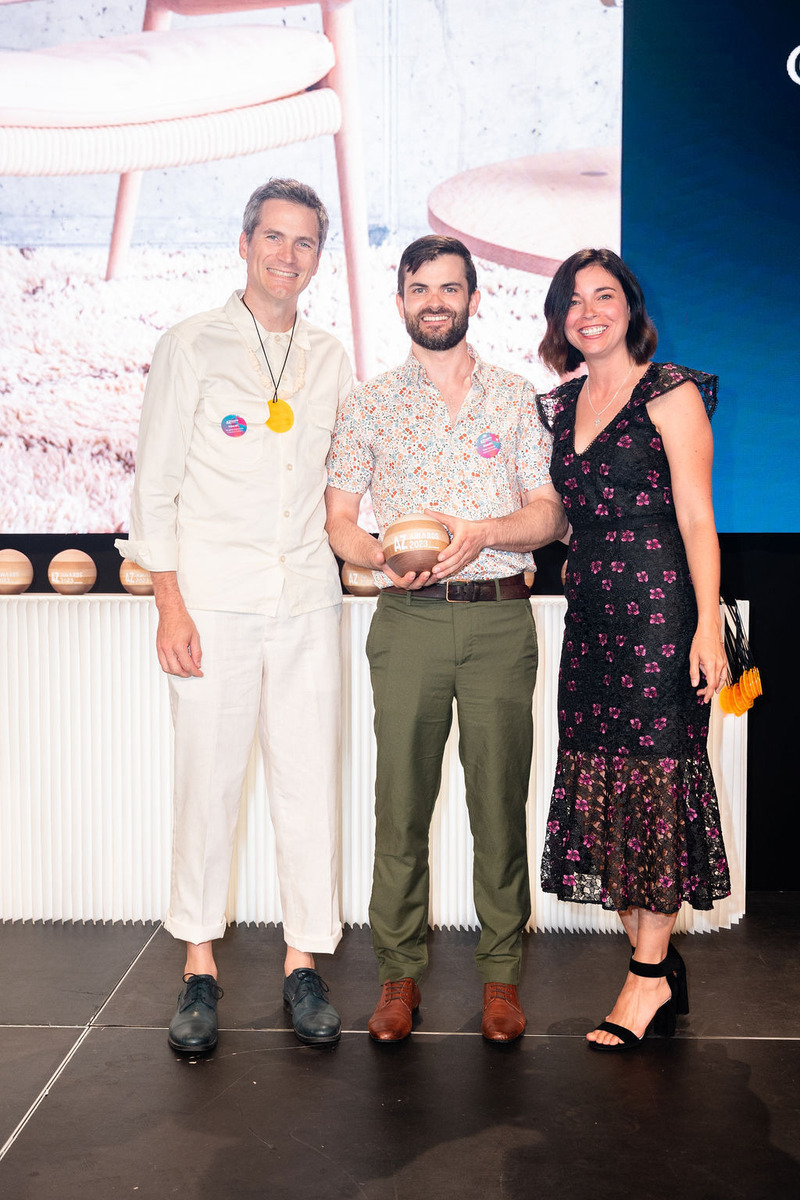 Dossier de presse | 809-38 - Communiqué de presse | Meet the Winners of the 2023 AZ Awards! - AZURE Media - Concours - Coolican &amp; Company's Stephen Dalrymple (left) and Peter Coolican receiving the 2023 AZ Awards trophy and People's Choice medallion from Caesarstone Toronto's Joyce Renfrew for Parkside Lounge, Winner &amp; People's Choice in Single-Piece Furniture Design category - Crédit photo : Mauricio Calero