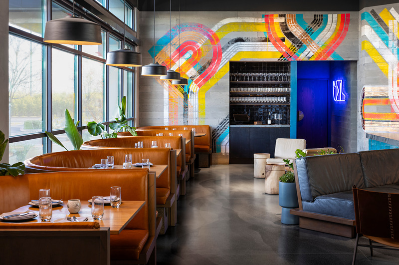 Press kit | 5857-03 - Press release | Saizon - Studio UNLTD - Commercial Interior Design - Upon entry, the eye is drawn to the striking color and energetic brushwork of a mural that derives inspiration from the geometries of the space and the forces of nature at play. - Photo credit: Zack Benson Photography