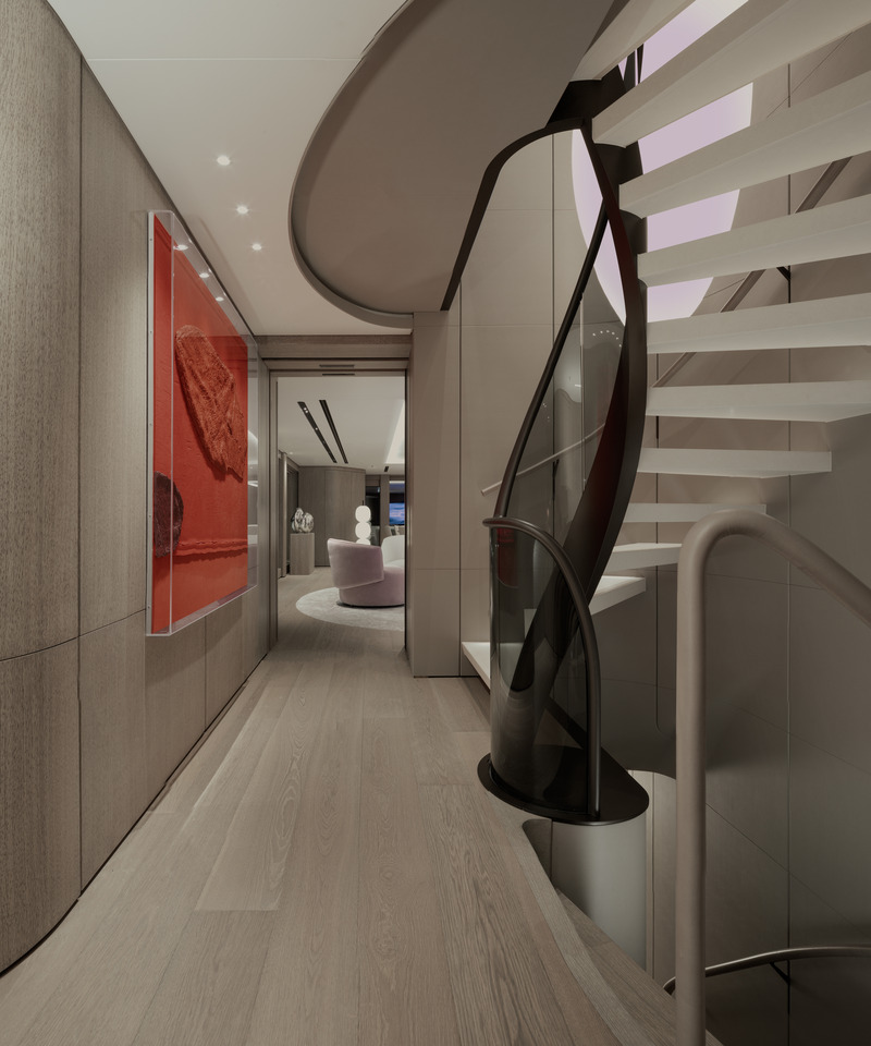 Press kit | 889-06 - Press release | BURDIFILEK Sets Sail Into the World of Luxury Yachting With Entourage - BURDIFILEK - Residential Interior Design - Main deck spiral staircase with passage leading to salon. - Photo credit: Guillaume Plisson