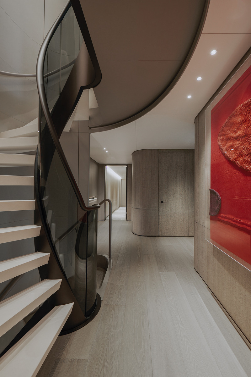 Press kit | 889-06 - Press release | BURDIFILEK Sets Sail Into the World of Luxury Yachting With Entourage - BURDIFILEK - Residential Interior Design - Opposite view of the spiral staircase leading to sleeping quarters. - Photo credit: Guillaume Plisson