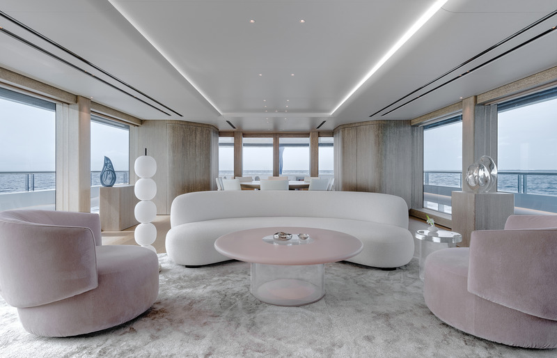 Press kit | 889-06 - Press release | BURDIFILEK Sets Sail Into the World of Luxury Yachting With Entourage - BURDIFILEK - Residential Interior Design -  Main deck salon featuring a custom coffee table by Burdifilek.  - Photo credit: Guillaume Plisson
